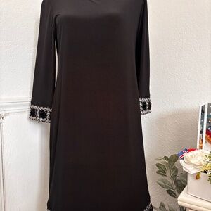 Black midi dress with silver accents